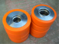 黑龙江聚氨酯滚轮加工，输送钢管滚轮包胶，输送轮包胶